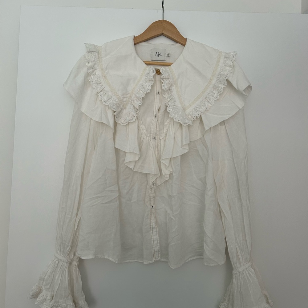 Aje white ruffle blouse size us 6